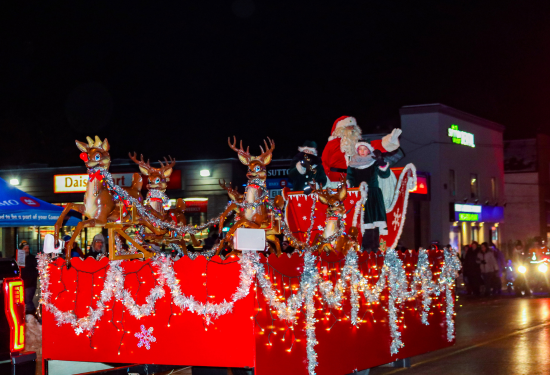 parade float with Santa Claus and the reindeer on it