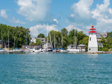 Lighthouse on the shore of the lake 